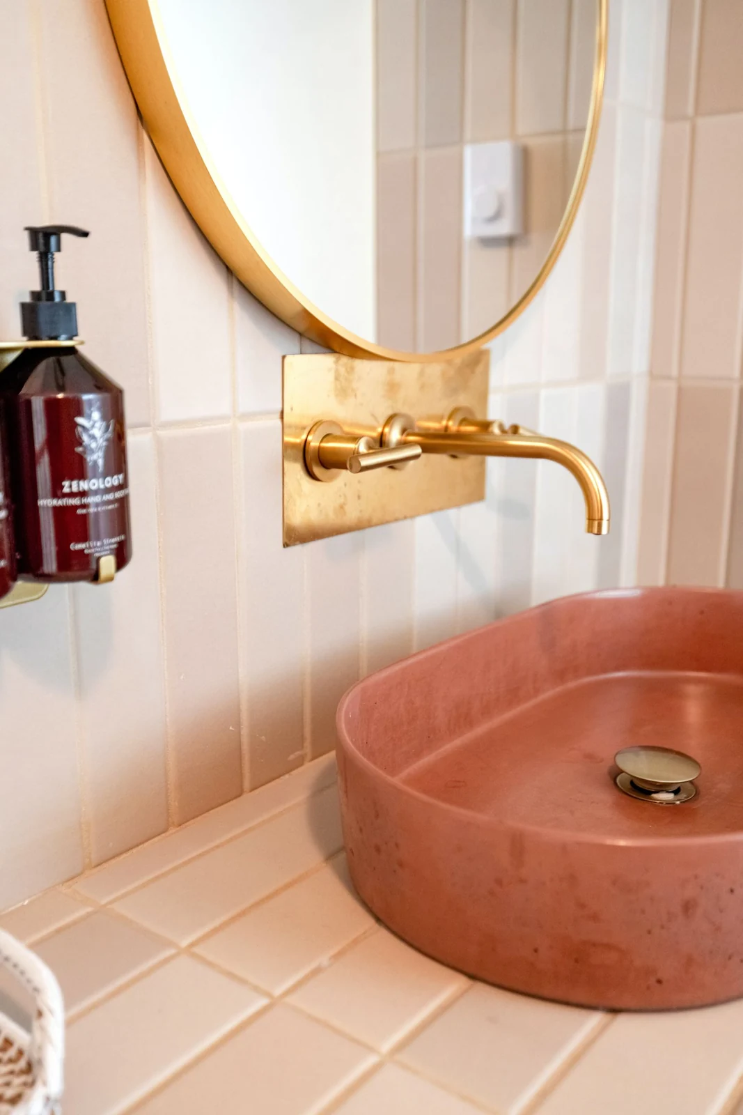 Terracotta basin and brass tap