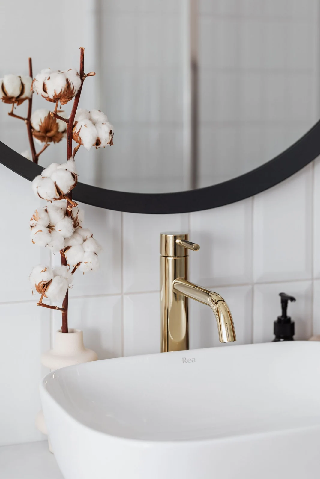 White bathroom basin and tap