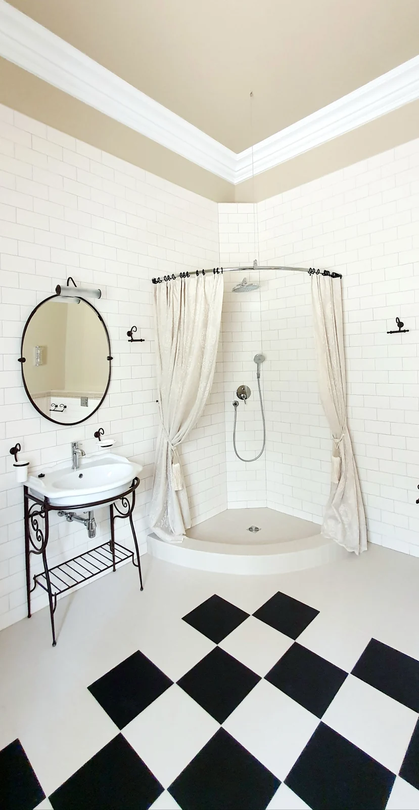 Chic bathroom with vintage style and checkered floor tiles, perfect for classic interior design